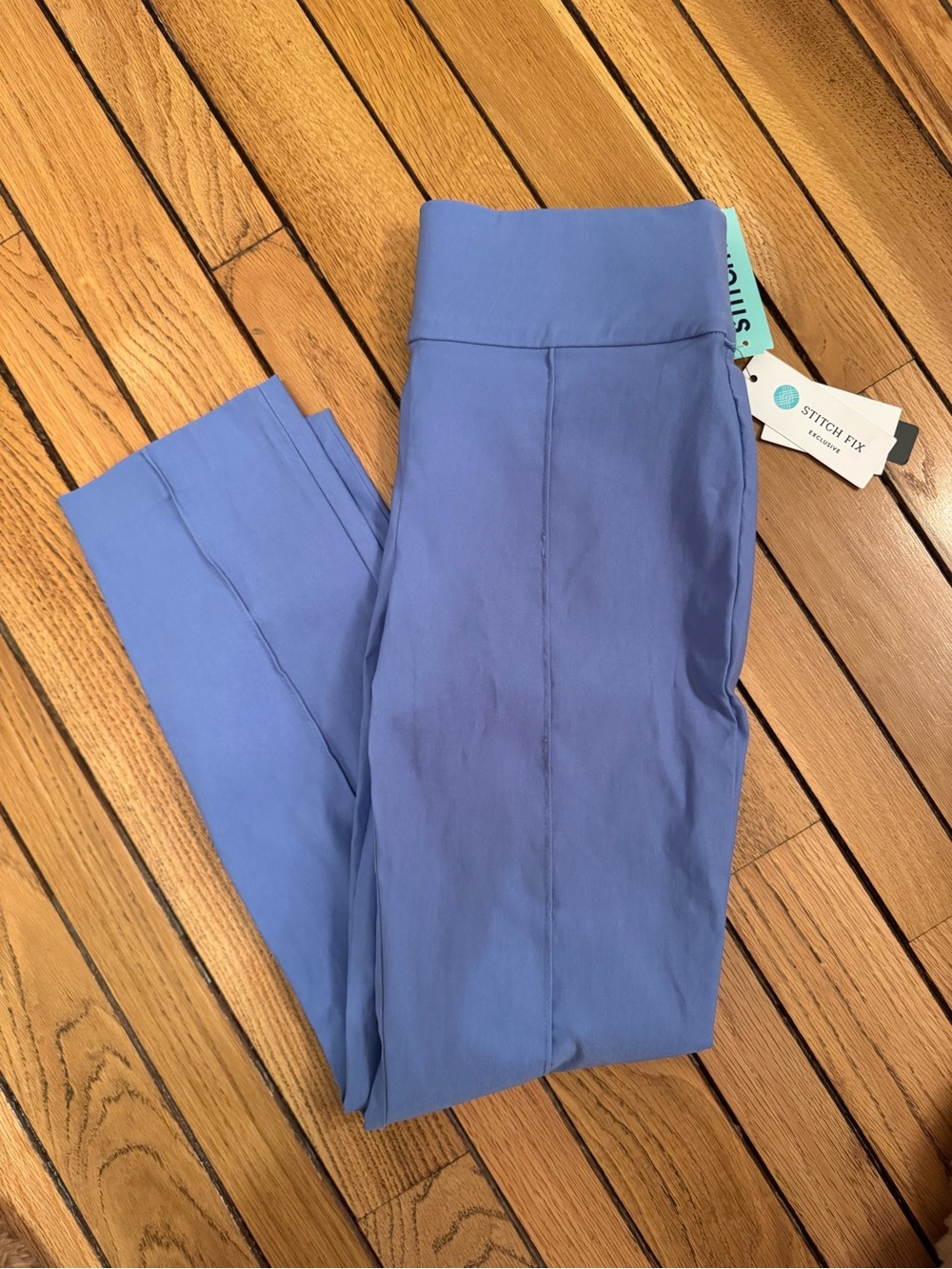 Violets & Roses blue pintuck pants featuring a high-waisted, pull-on style